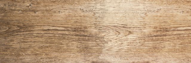 a clean wooden desk surface